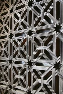 Pattern of star, triangle and square in wooden door Stock Photos