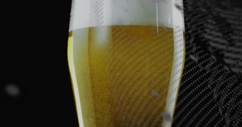 Pattern starting sweep right, pint glass holding amber beer, bubbles rising, Stock Footage 330397358