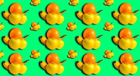 Pattern with a still life of fruit on a green background with a shadow. Apple Stock Photos