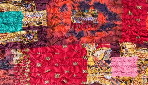 Pattern of stitched red brown patchwork scarf Stock Photos