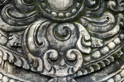 The pattern on the stone is a closeup of a Balinese temple Stock Photos
