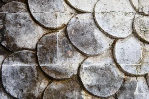 The pattern on the stone is a closeup of a Balinese temple Foto stock