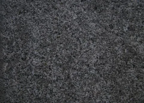 Pattern stone granite dark gray smooth smooth texture for your desktop Stock Photos