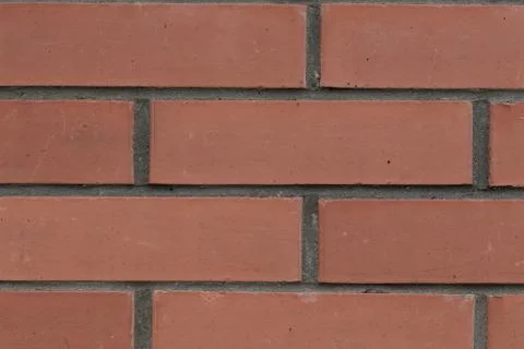 Pattern stone wall dark red brick with cement lines background base solid Foto stock