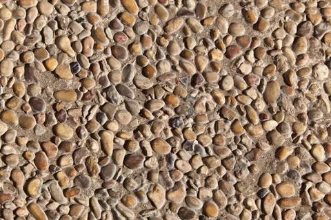 Pattern of stones in concrete Foto stock