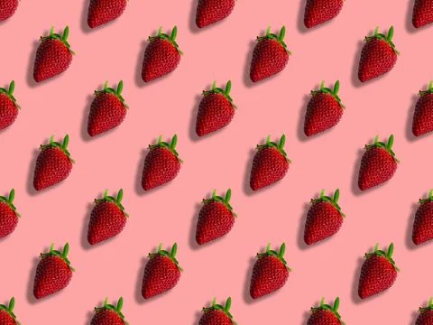Pattern of strawberries isolated on pink background. Seamless pattern Stock Photos