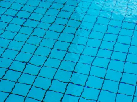 Pattern of sunlight on the bottom of a pool. 스톡 사진