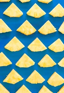 Pattern of Sweet pineapple on blue background top view, flat lay Stock Photos
