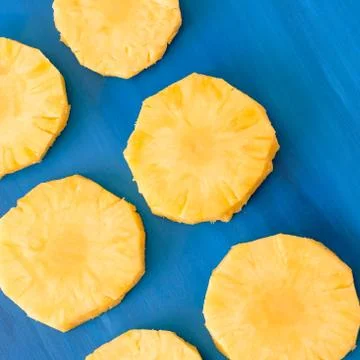 Pattern of Sweet pineapple on blue background top view, flat lay 스톡 사진
