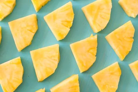 Pattern of Sweet pineapple on blue background top view, flat lay 库存照片