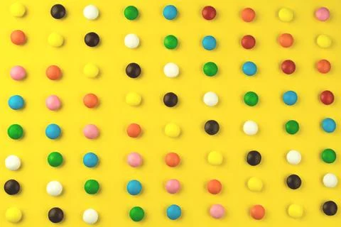 Pattern from sweets in colored glaze. Creative geometric bright wallpaper Stock Photos