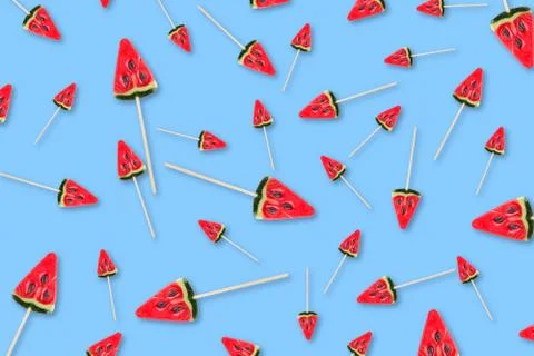 Pattern of sweets in form of watermelon on blue background Foto stock