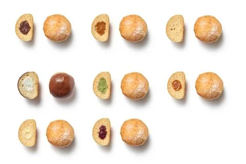 Pattern of tasty sweet donuts with different creamy fillings isolated on white Foto stock