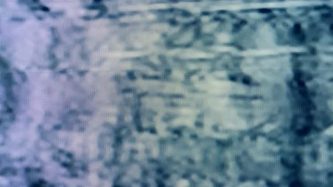 Pattern of television glitches in pixels. Real glitch defects noise from an old Stock Footage 123647679
