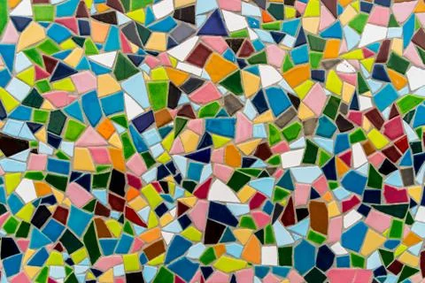 Pattern texture of colorful small mosaic tiles on the wall. Stock Photos
