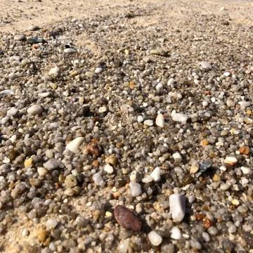 Pattern, texture different sand fraction yellowish brown Stock Photos