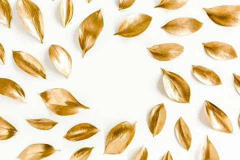 Pattern, texture with gold leaves isolated on white background. flat lay, top Stock Photos
