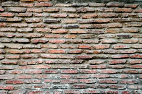 Pattern texture of old vintage orange brick wall Stock Photos