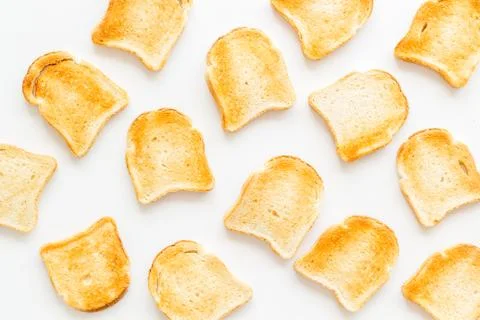 Pattern of toast bread slices. Layout of food, overhead view Stock Photos