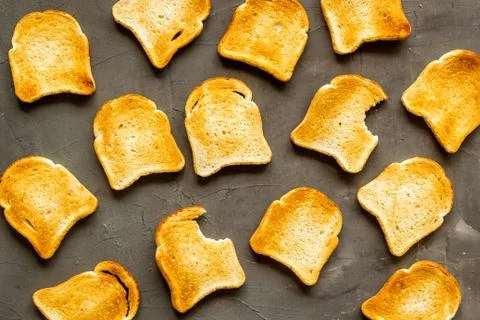 Pattern of toast bread slices. Layout of food, overhead view Stock Photos