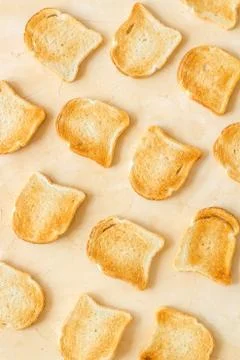 Pattern of toast bread slices. Layout of food, overhead view Stock Photos