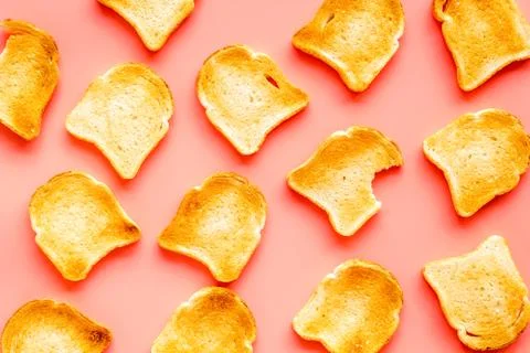 Pattern of toast bread slices. Layout of food, overhead view Stock Photos