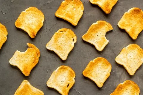 Pattern of toast bread slices. Layout of food, overhead view Stock Photos