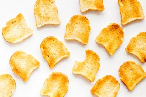 Pattern of toast bread slices. Layout of food, overhead view Stock Photos