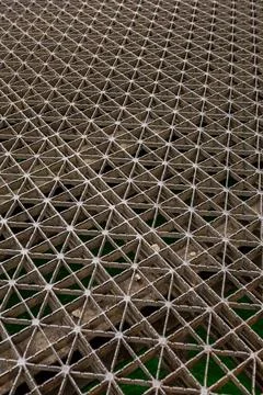 Pattern of triangles made from cardboard in a geometric design on a flat su.. Stock Photos