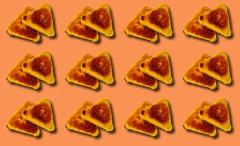 Pattern of Triangular fried cutlets on an orange background. Stock Photos