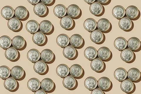Pattern of triangular groups of three food cans Stock Photos