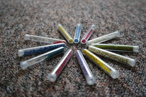 Pattern of tubes with small beads from side Stock Photos