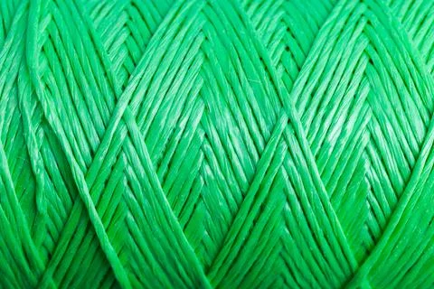 Pattern of twisted green polypropylene cord Stock Photos