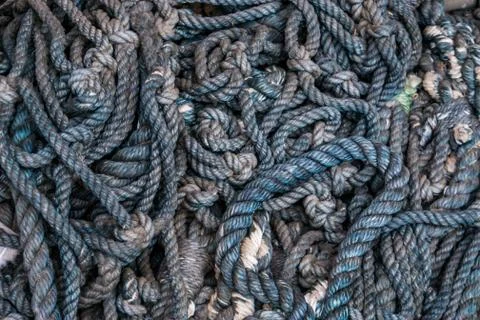 Pattern of twisted ropes, sailing equipment, nautical background Foto stock