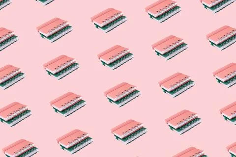 Pattern of two mini notepads on pink background Foto stock
