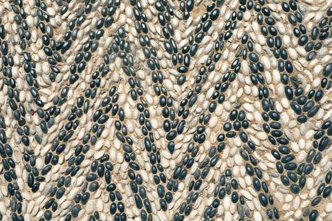 Pattern of uneven stones arranged as a triangle Stock Photos