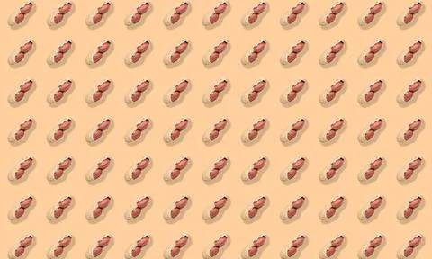 Pattern of unpeeled peanuts on beige background Stock Photos