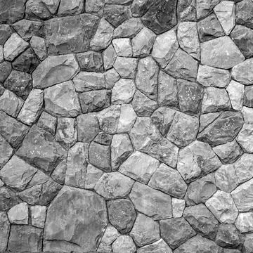 Pattern of unshape stone wall background Stock Photos
