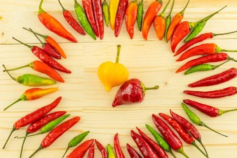 Pattern of vegetables bright fresh chili peppers folded in a circle red Stock Photos