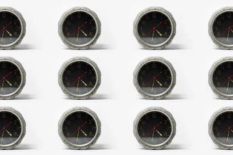 Pattern of vintage alarm clock isolated on white background. Stock Photos