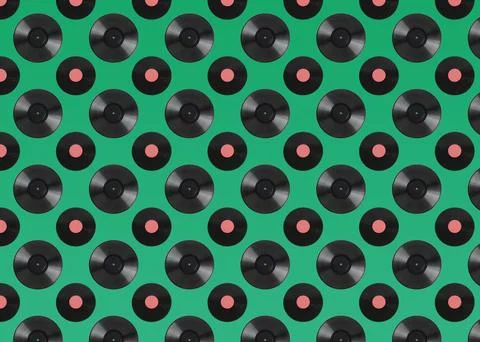Pattern of vinyl records on green background Stock Photos