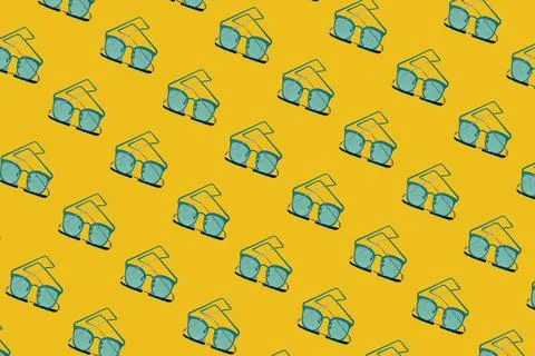 Pattern of vision glasses with shadow on yellow background. Fashionable seamless Stock Photos