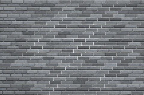 Pattern wall of gray bricks. Brick background for design. Stock Photos
