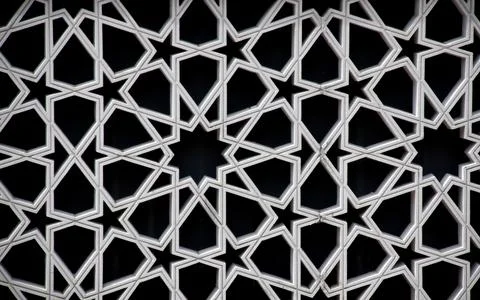 Pattern on the walls of a mosque isolated on the black background in Kuala Stock Photos