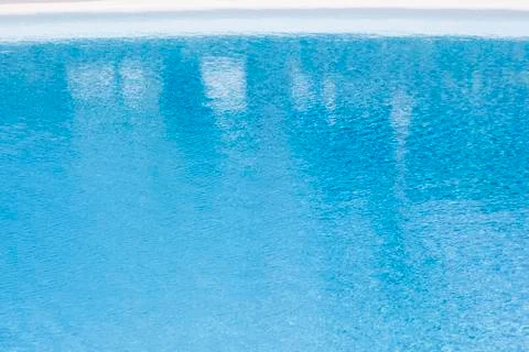 Pattern of water in the pool reflecting the sun in a harmonic way 写真素材
