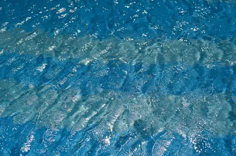 Pattern water texture in a swimming pool Stockfoto's