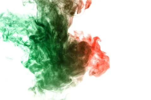 Pattern of wavy green and red smoke in the form of a bird of prey with wings  写真素材