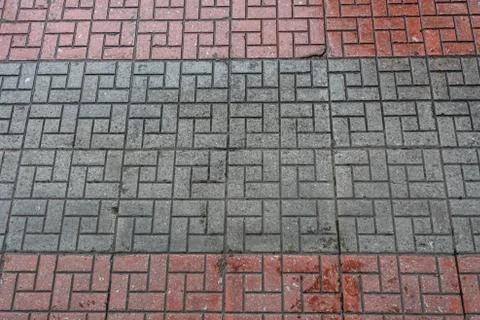 Pattern of the wet footpath floor. Photos