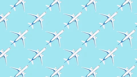 Pattern with white airplane moving on blue background Stock Footage 148997593
