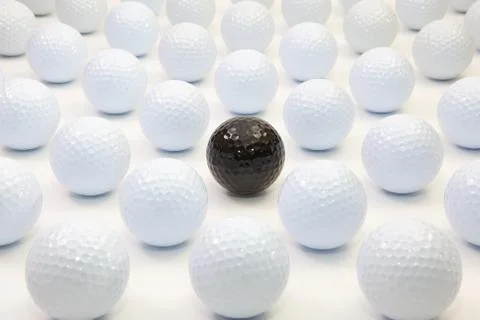 Pattern with white and black golf balls Stock Photos